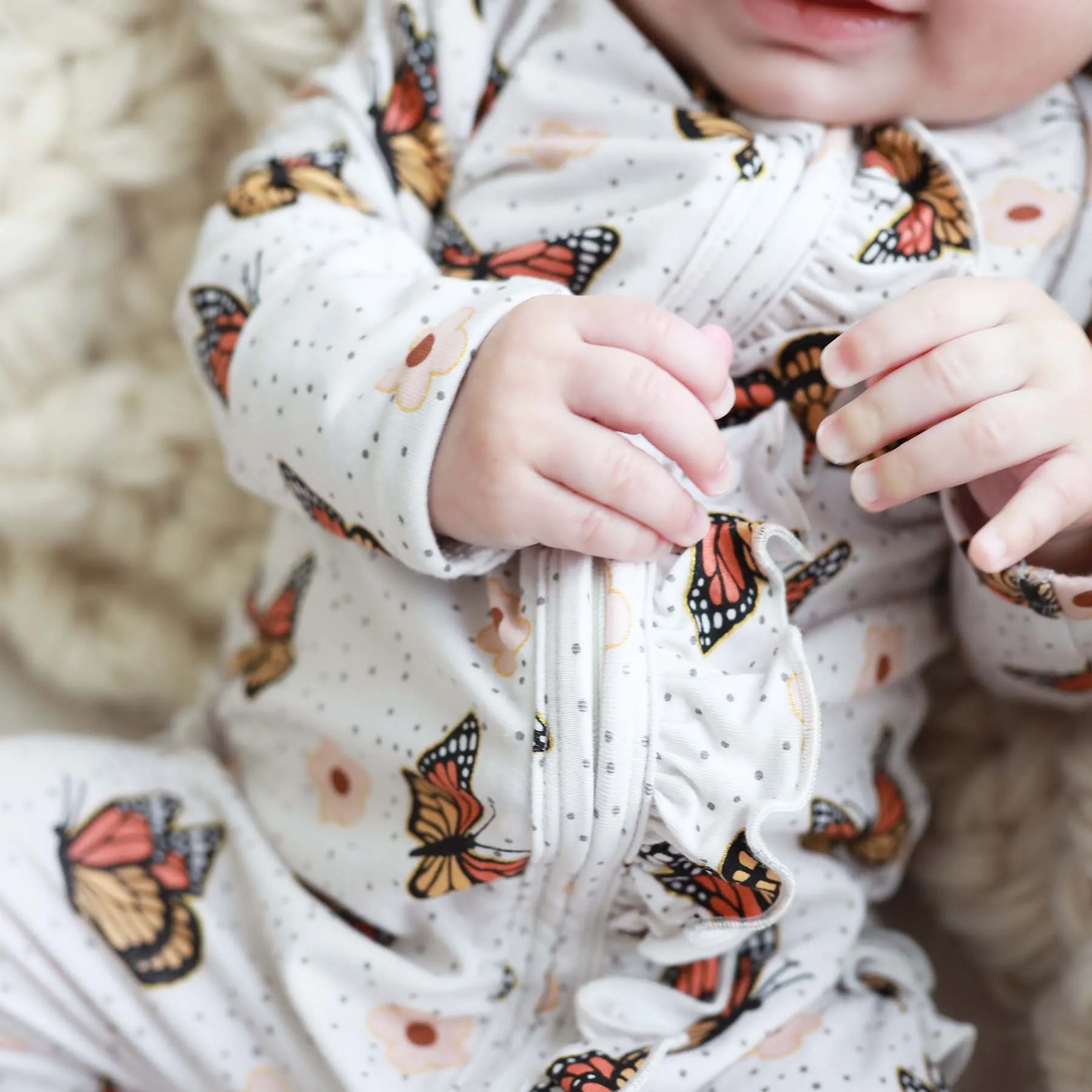 Butterfly Kisses Ruffle Zipper Footie