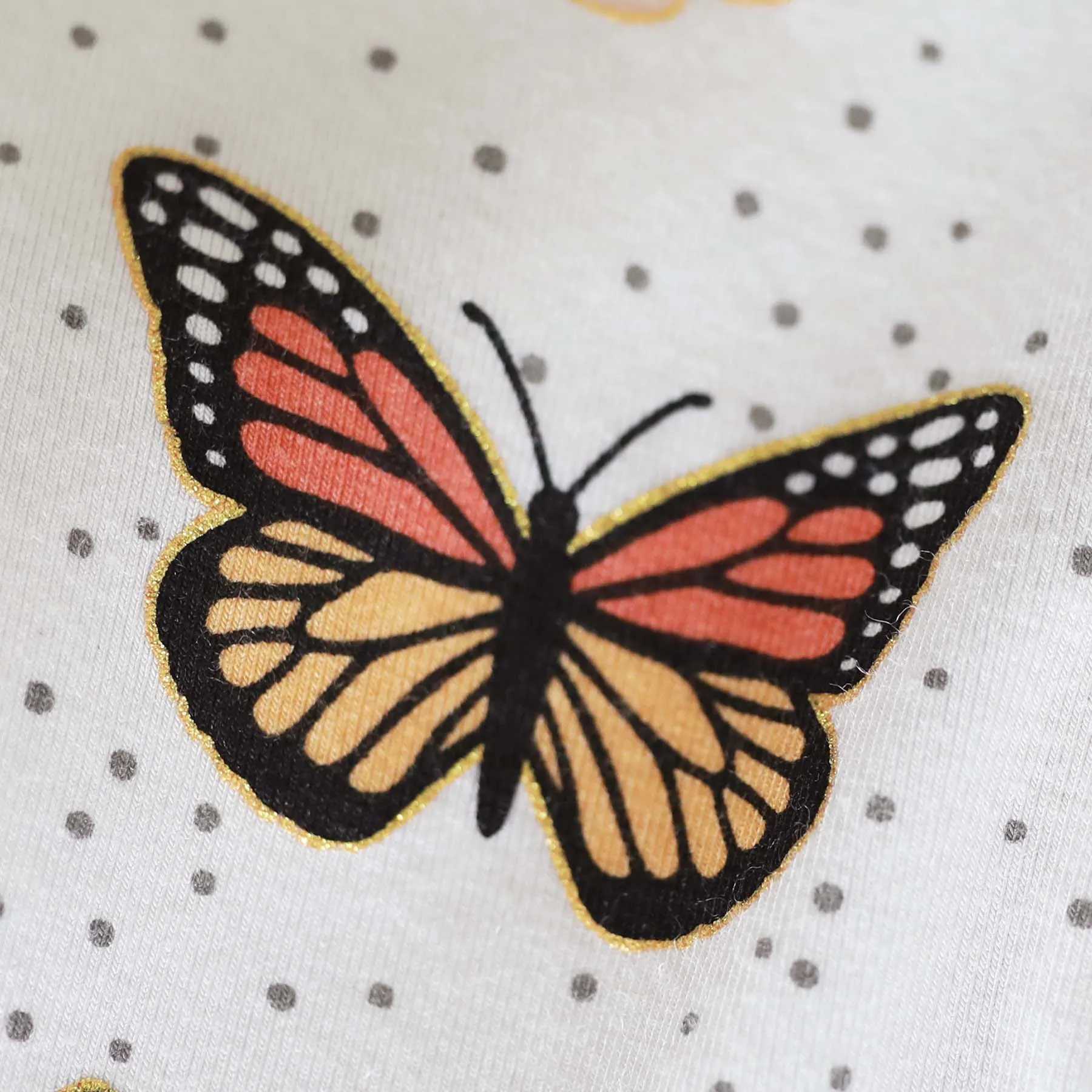 Butterfly Kisses Ruffle Zipper Footie